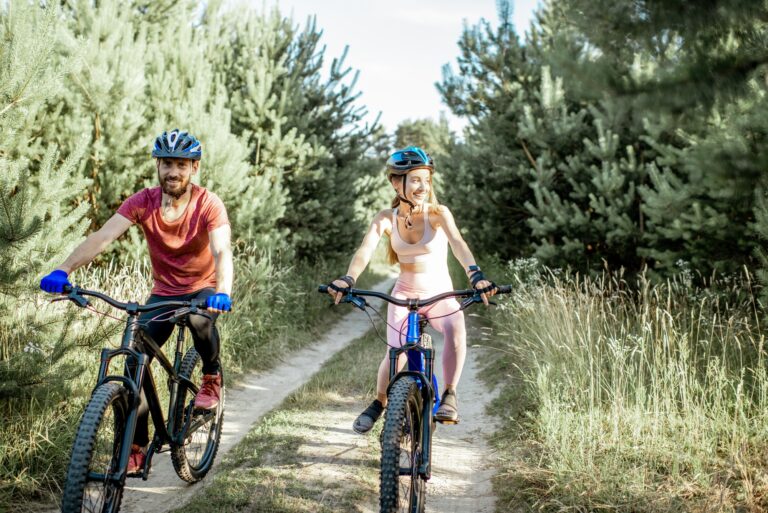Cyclists riding mountain bicycles outdoors